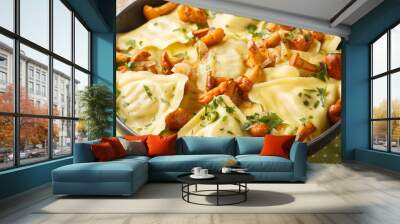 Triangoli Italian pasta in the shape of a triangle with forest mushrooms, onions and herbs close-up in a plate on the table. Horizontal Wall mural