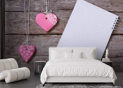 Two sweet pink heart cookies and a note on a wooden board Wall mural