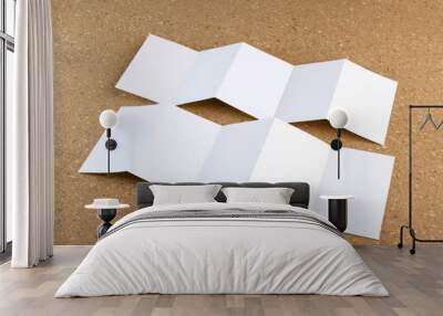 blank white folding paper flyer on a cork background Wall mural