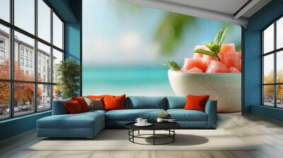 Watermelon bowl filled with cubed fruit and mint leaves, set against a tropical beach backdrop for a refreshing feel. Wall mural