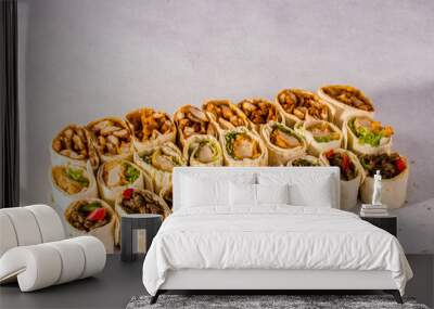 assorted shawarma platter, doner kabab wraps family deal side view isolated on grey background turkish fastfood Wall mural