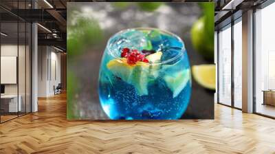 Blue drink. exotic colorful drink with blue curacao Wall mural