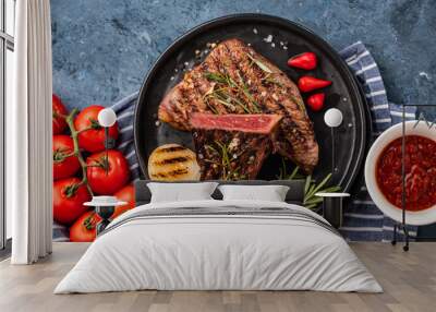 Steak beef. Beef steak medium with red pepper, aromatic herbs and fried onion Wall mural