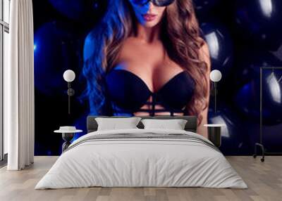 A brunette with a perfect body dressed in black lingerie. Wall mural