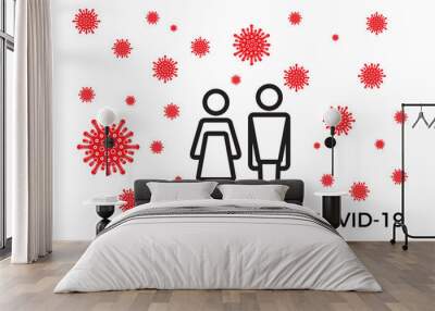 Male and female icons surrounded by Covid-19 virus in the air. Coronavirus Covid infection concept Wall mural