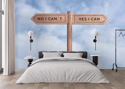 Yes I can concept or No I can not. Signpost with two messages on opposite way and sky background Wall mural