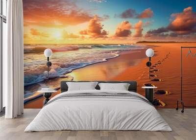 Beautiful seascape with footprints in the sand at sunset. Wall mural