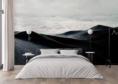 Minimal dark wallpaper. Black mountain with grey clouds, sand dunes, sombre, moody 4k background. Wall mural