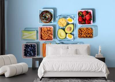 Healthy food concept, lunch boxes filled with fresh snacks Wall mural