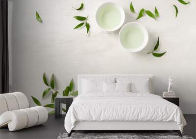 Two white cups of tea, view from above background Wall mural