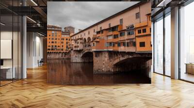 Beautiful view of the old bridge Ponte Vecchio located in Florence, Italy Wall mural