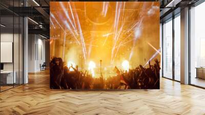 Crowd at concert and blurred stage lights with fireworks Wall mural