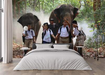 Students Walk To School Through Forest Alongside Elephants Wall mural