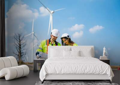 Wind turbine service engineer maintenance and plan for inspection at construction site, renewable electricity generator. Wall mural