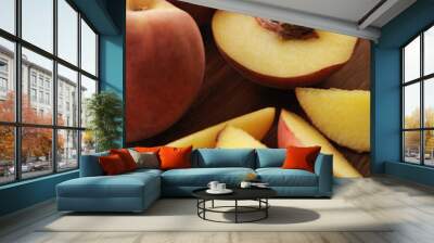 Peach cut in half with focus on peach pit. Wall mural