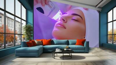 A professional skincare treatment with LED technology taking place in a modern salon during the daytime Wall mural