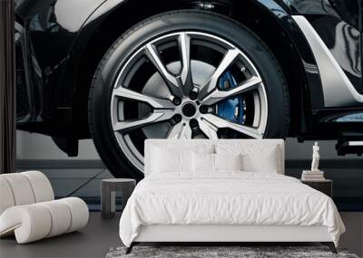 Aluminium rim of luxury car wheel close up Wall mural