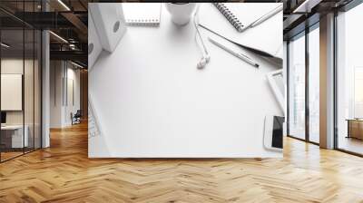 Business Items dropped in creative Disorder on white Table Wall mural