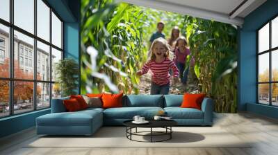 Children joyfully running through a cornfield on a sunny day in autumn, surrounded by tall green stalks and warm sunlight Wall mural