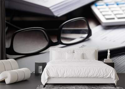 Close up shot of Eyeglasses  on contract document papers business concept Wall mural