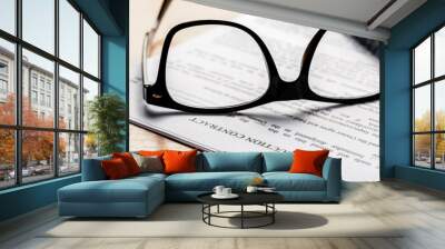 Close up shot of Eyeglasses  on document papers business concept Wall mural