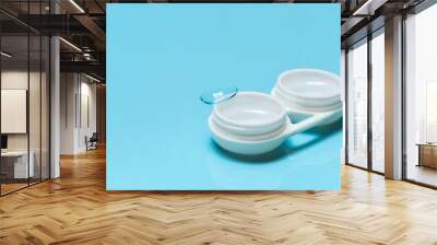 Contact lens, contact lens case, tweezers Wall mural