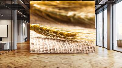 Ears of wheat on a sackcloth Wall mural