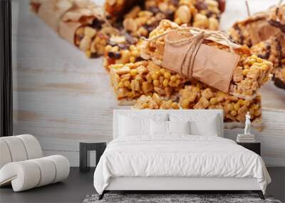 Granola bar on wooden background Wall mural