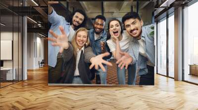 Happy overjoyed business team celebrate corporate victory Wall mural