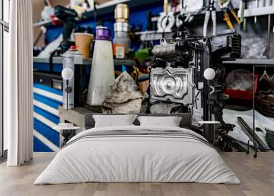 Large workbench with tools at station for vehicle technical servicing Wall mural