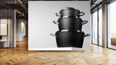 New domestic cookware on grey background close up Wall mural