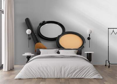 Open box with make up face powder on gray background Wall mural