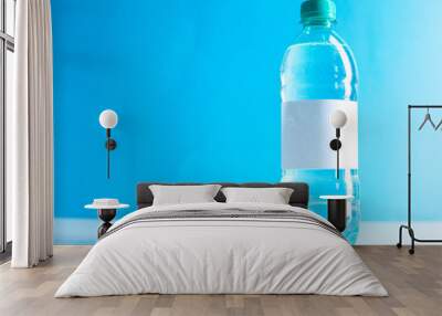 Plastic bottle of drinking water Wall mural