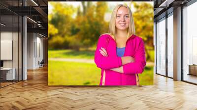 Portrait of beautiful smiling young woman Wall mural