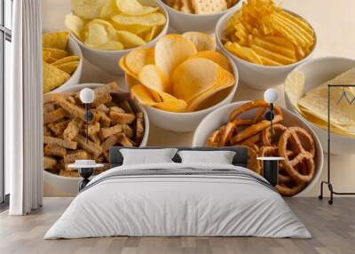 Pretzels in bowls on wooden table from above Wall mural