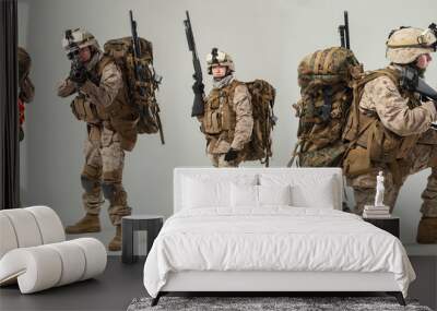 Soldier in camouflage holding rifle Wall mural