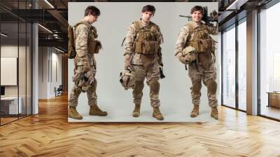 Soldier in camouflage holding rifle Wall mural