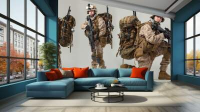 Soldier in camouflage holding rifle Wall mural