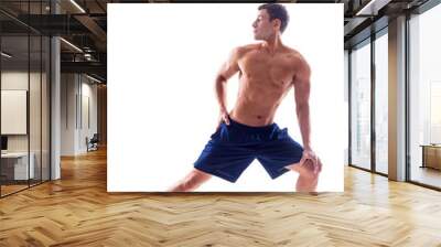 Very power athletic guy bodybuilder Wall mural