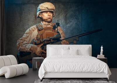 War, army, weapon concept. Private military contractor holding rifle Wall mural