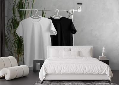 White and black T-shirts on hangers for design presentation Wall mural