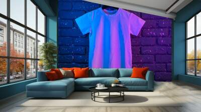 White color unisex t-shirt in neon light , copy space Wall mural