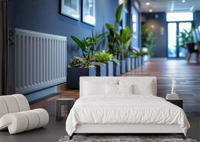 White Radiator in Modern Office Hallway With Plants and Hardwood Flooring Wall mural