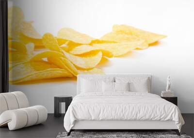 yellow potato chips isolated on white Wall mural