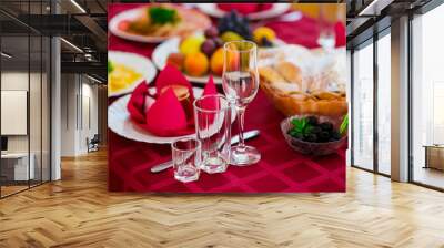 Beautiful decoration on the holiday table. red colors. Wall mural