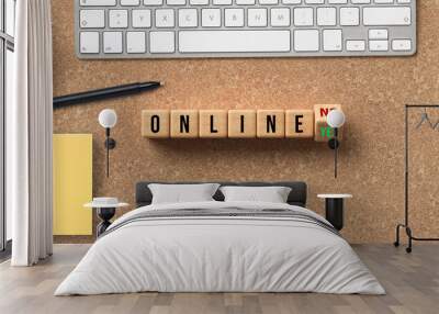 cubes with message ONLINE YES / NO and office equipment on cork background Wall mural