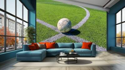 Football on artificial turf. It is for green background in a stadium Wall mural