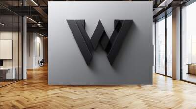 A black w logo on a gray wall, great for minimalist designs and branding materials Wall mural