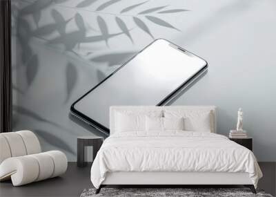 A cell phone sitting on a table, perfect for editorial and commercial use Wall mural