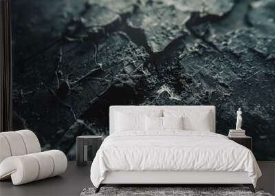 A close-up view of a cracked glass surface with fine lines and fractures Wall mural